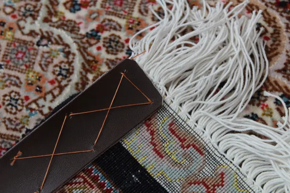 modelul de pe spatele covoarelor persane originale și nodurile acestora